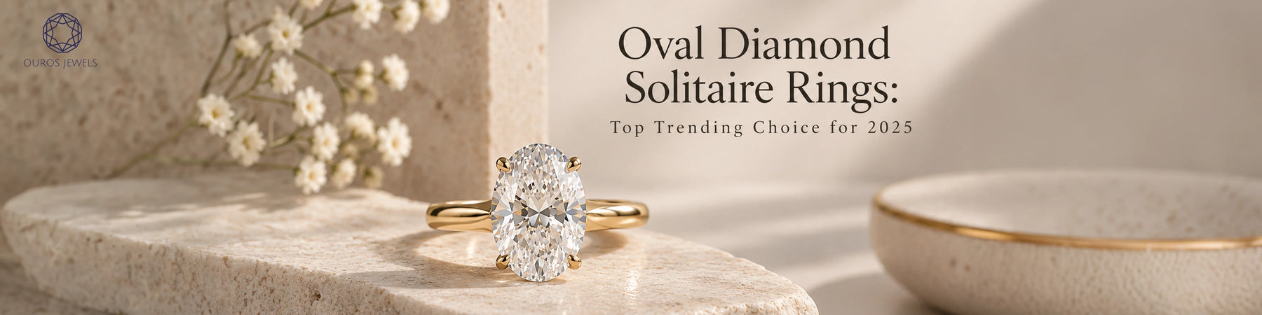 Gold solitaire engagement ring featuring an oval diamond, displayed on a stone pedestal with white flowers and text about oval diamond rings trending in 2025.