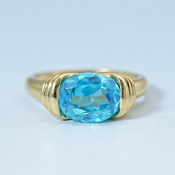 East-West Blue Oval Gemstone Solitaire Ring Rings