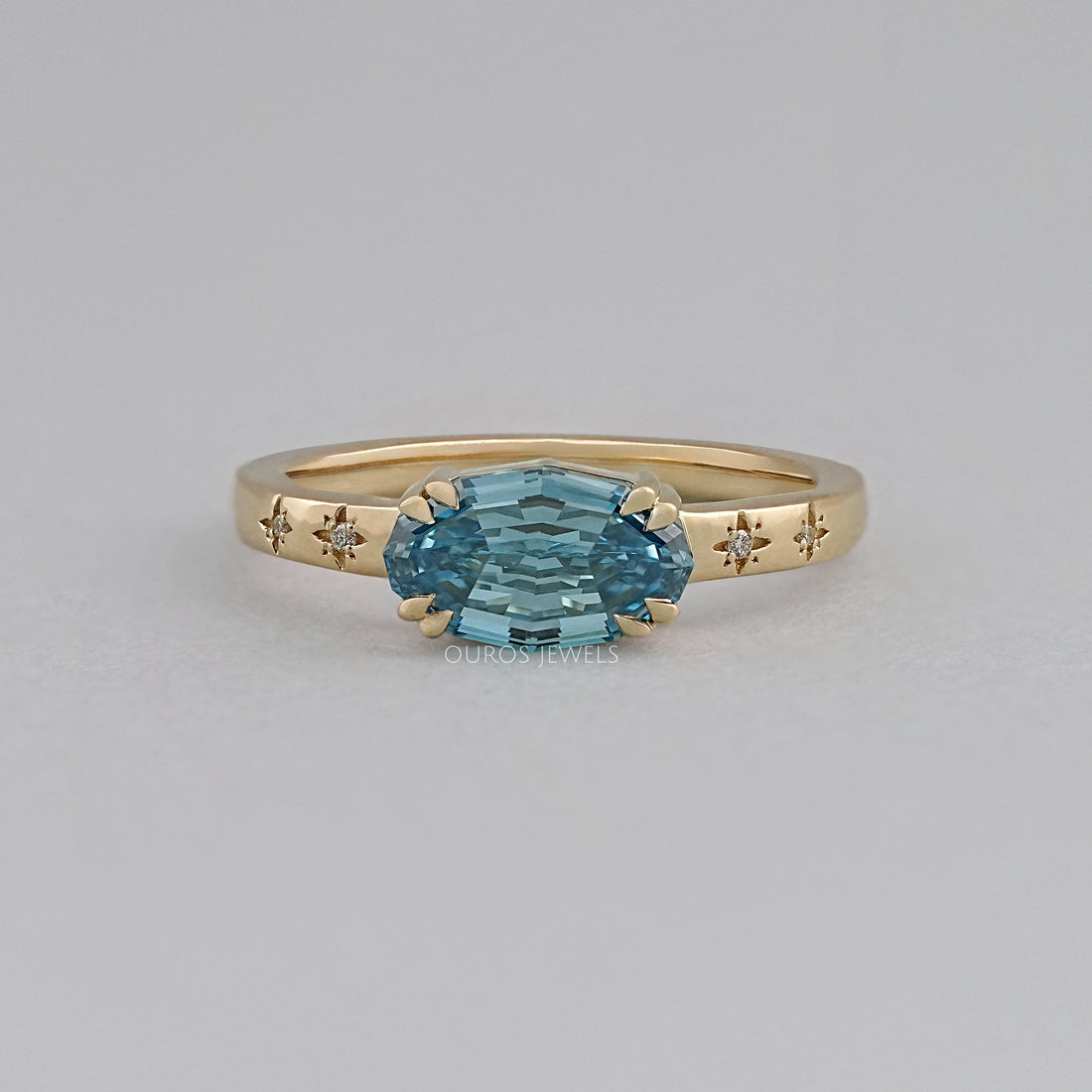 East-West Blue Step Cut Oval Accent Diamond Ring Rings