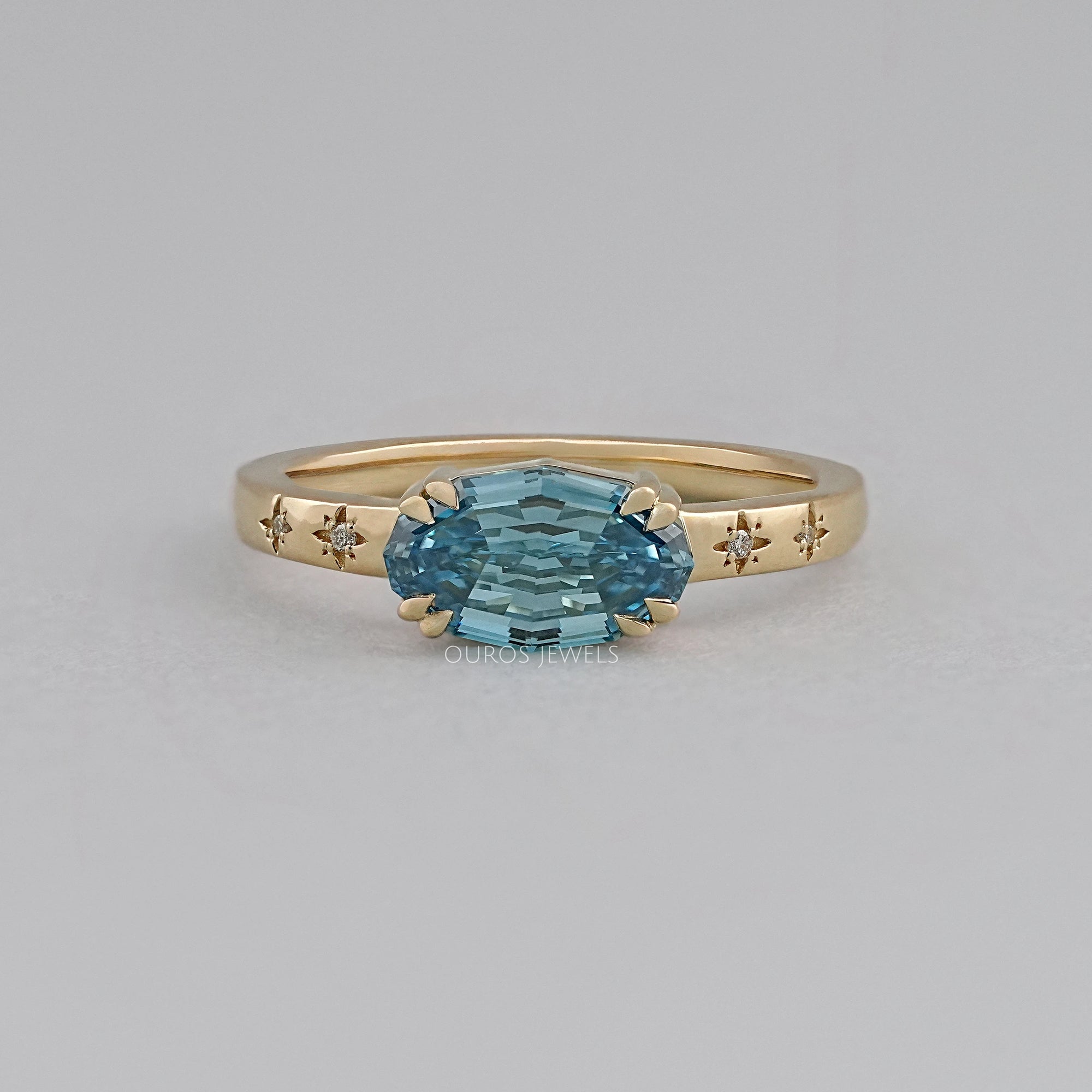 East-West Blue Step Cut Oval Accent Diamond Ring Rings