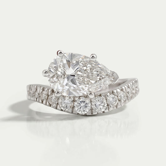East West Pear Cut Diamond Wave Ring Ring