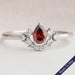 Red Pear Diamond Curved Halo Ring