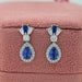 Pear Blue Gemstone And Tapered Baguette Halo Drop Earrings Earrings