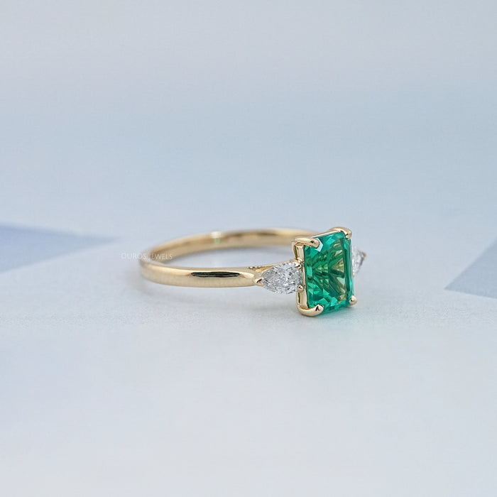 Emerald Gemstone And Pear Diamond Trio Engagement Ring Rings