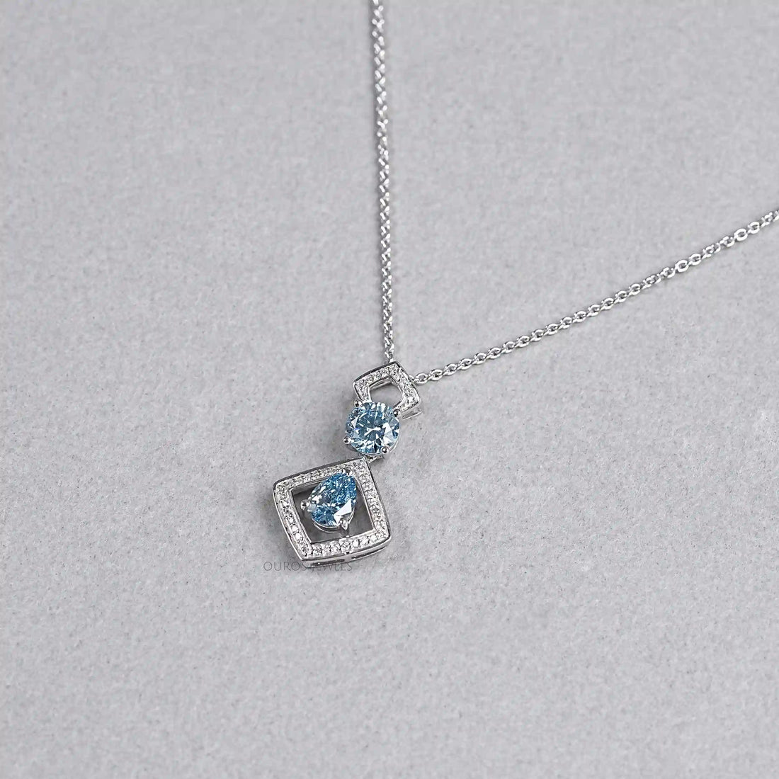 Blue Pear Diamond Halo Floating Pendant Necklaces