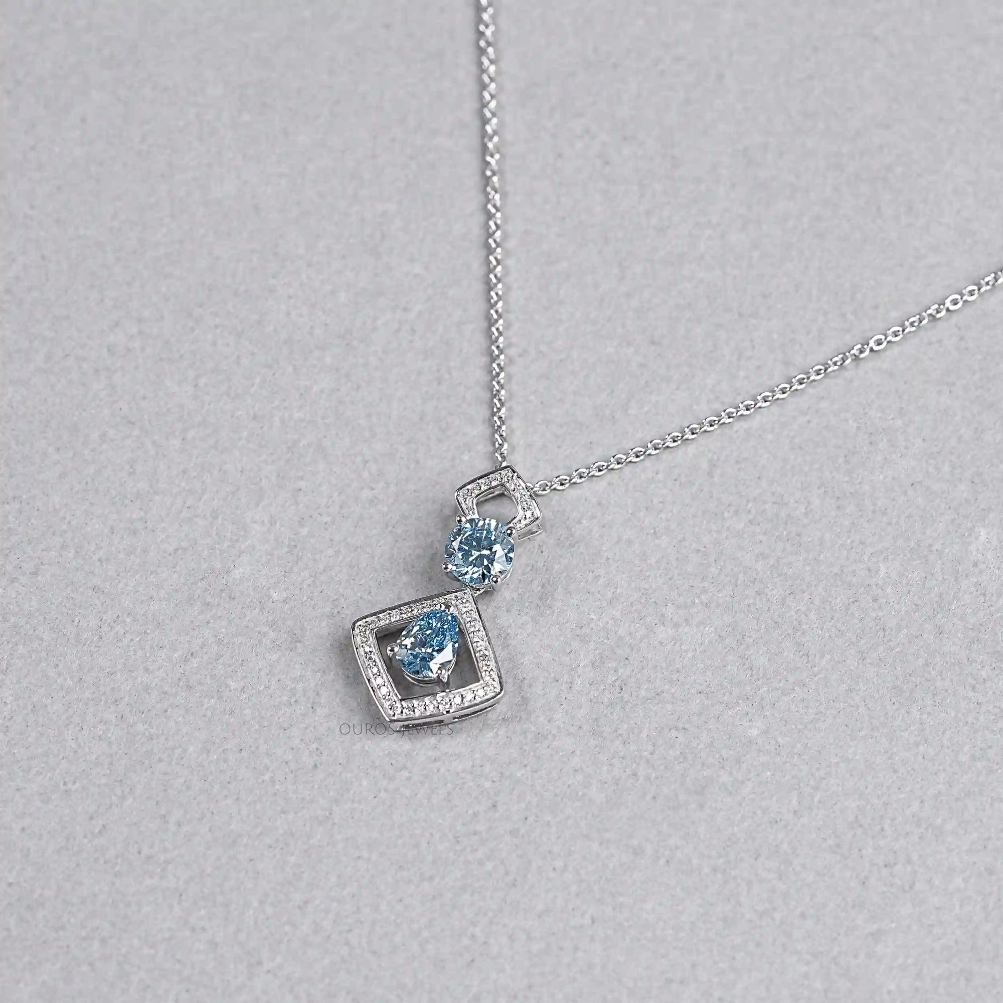 Blue Pear Diamond Halo Floating Pendant Necklaces