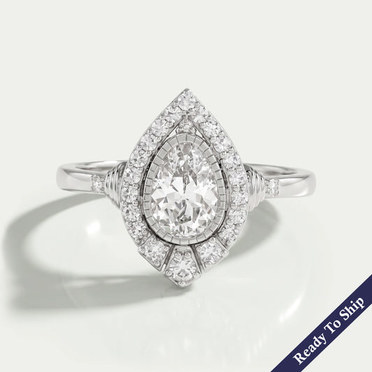 Old Mine Pear Cut And Single Round Halo Engagement Ring
