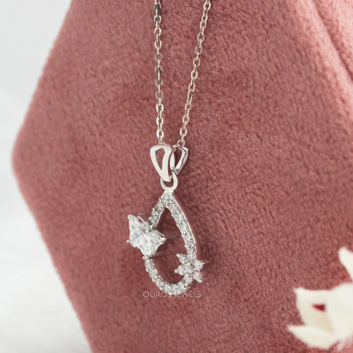 Open Pear Shaped Butterfly And Round Cut Pendant