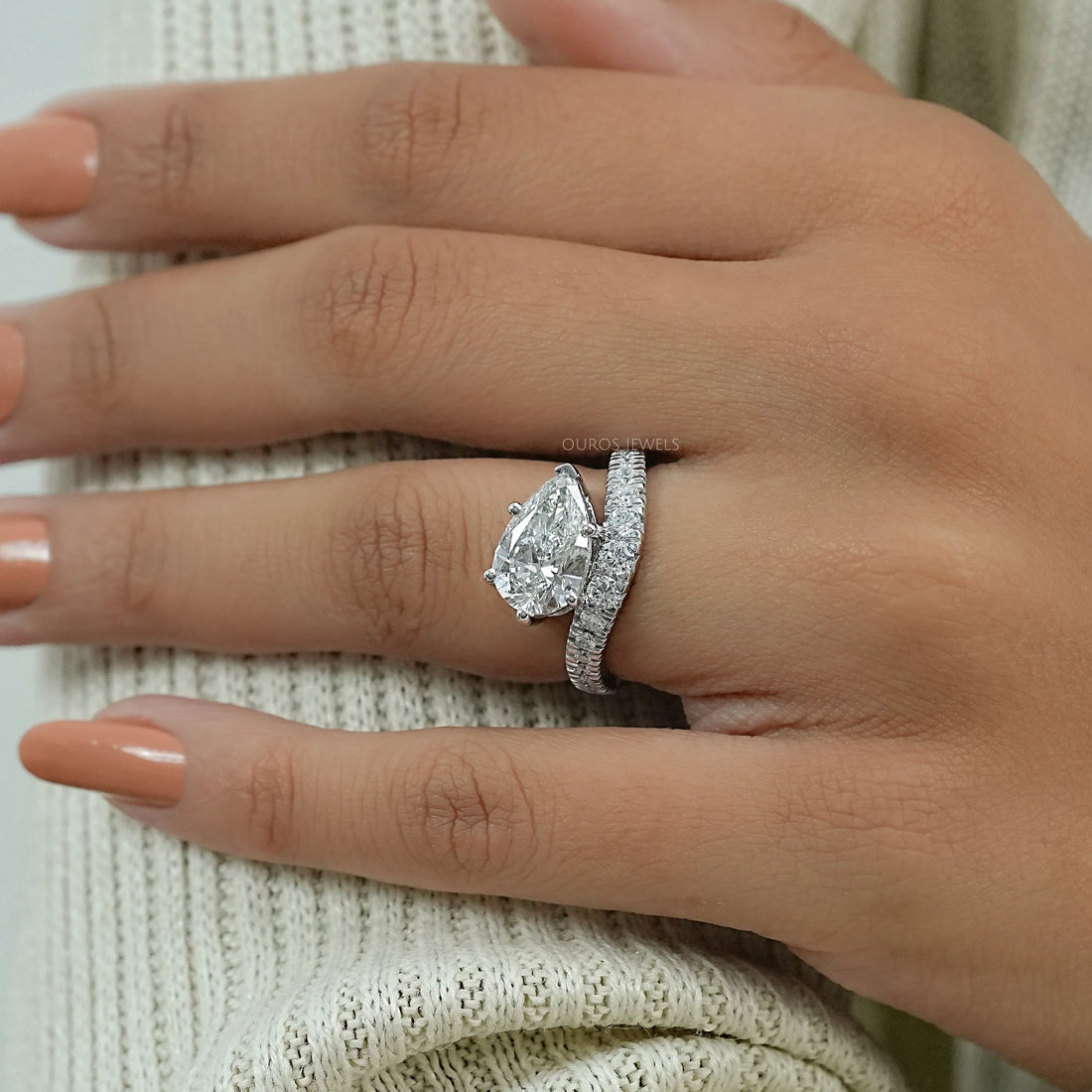 East West Pear Cut Diamond Wave Ring Ring