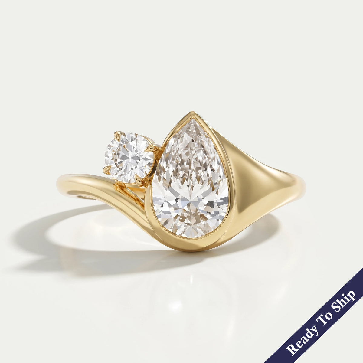 Bezel Set Pear Diamond Toi Et Moi Engagement Ring