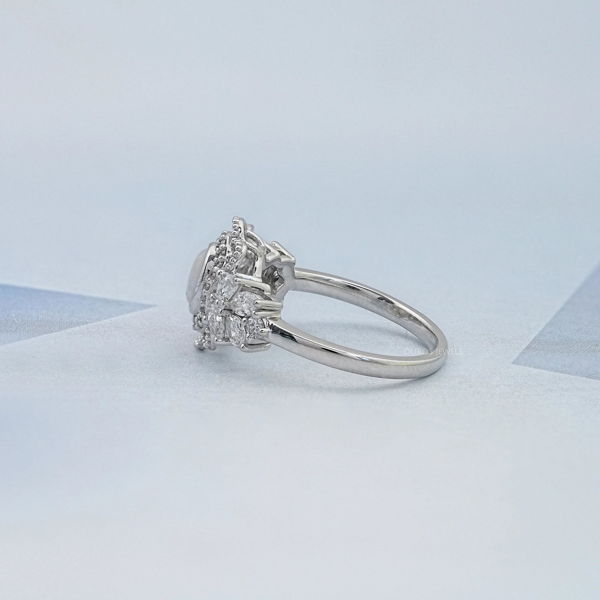 Opal Oval Cut And Halo Diamond Floral Engagement Ring