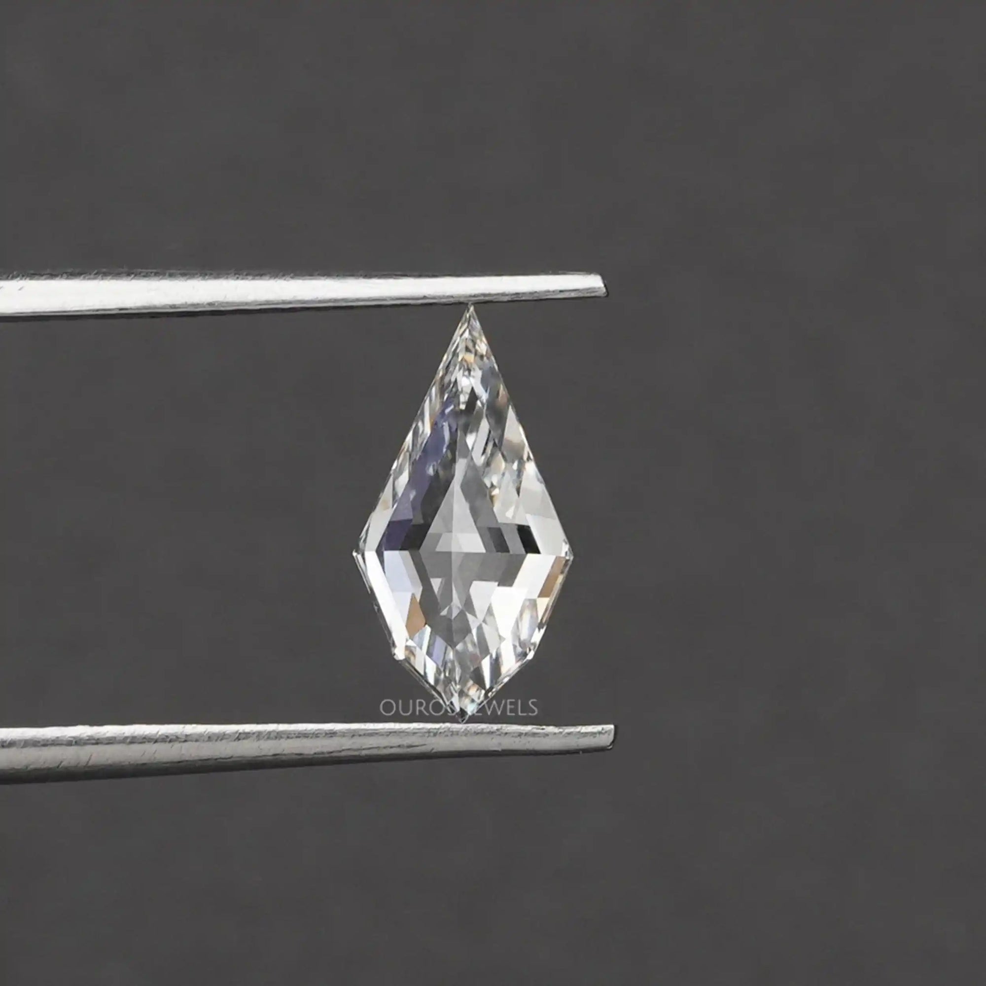 4.15 TCW Step Cut Pear And Kite Diamond Loose Pair