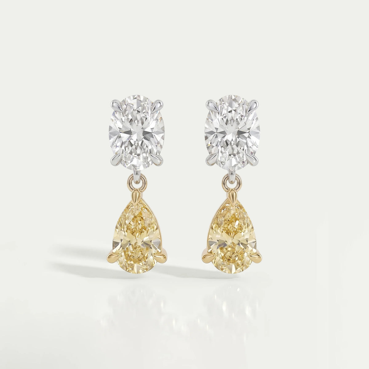 Fancy Yellow Pear And Oval Diamond Drop Earrings Earrings