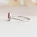 Red Pear Diamond Curved Halo Ring