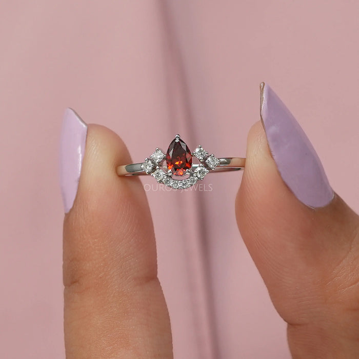 Red Pear Diamond Curved Halo Ring